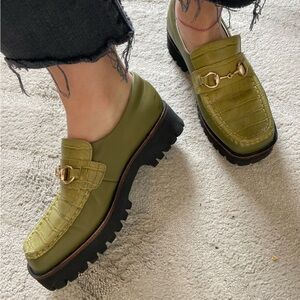 INTENTIONALLY BLANK Green Flats with Gold Detail